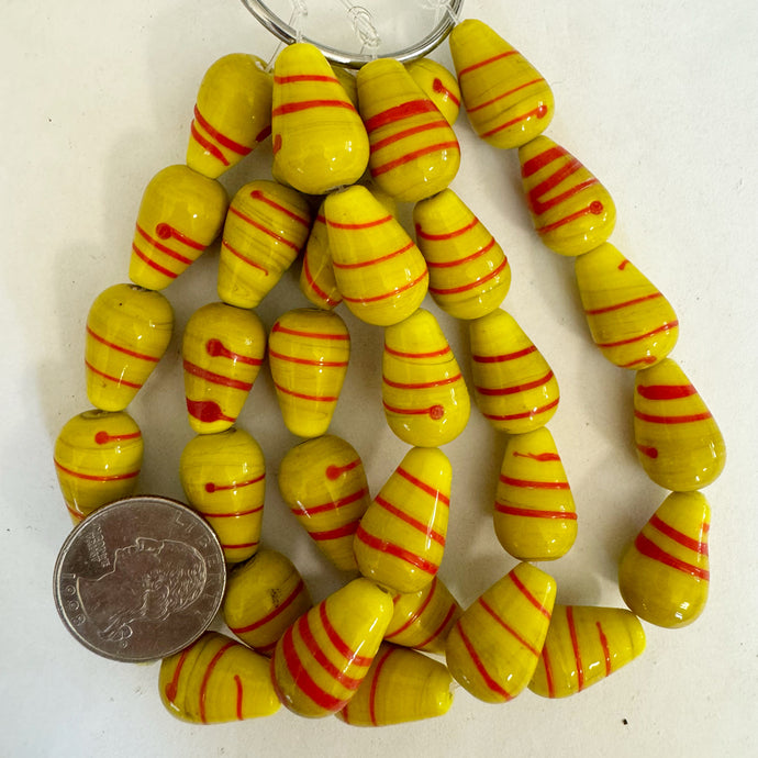 swirl motif glass, yellow red, 20x13mm pear, 11 piece strand, sold per strand