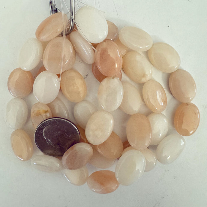 peach jade, 19x14x6mm puff oval, 11 piece strand, sold per strand