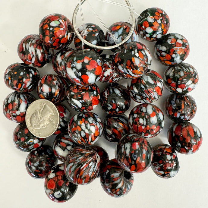 dotted motif glass, dotted red white over black, 23x22mm roundel, 11 piece strand, sold per strand