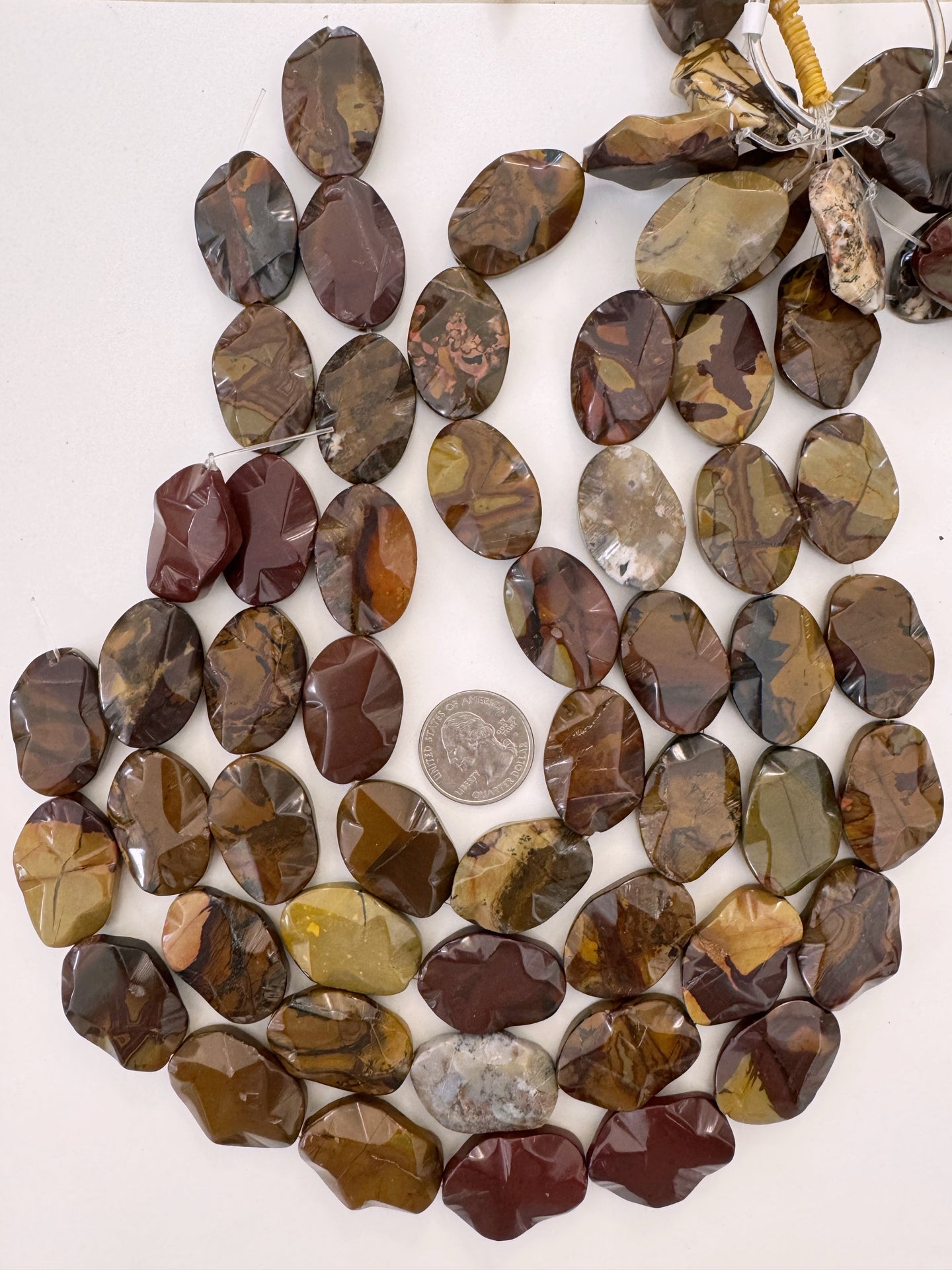 red wooden jasper, 30x21x6mm wavy oval, 15
