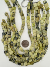 yellow turquoise, 10x10x4mm coin, 15" strand, sold per strand