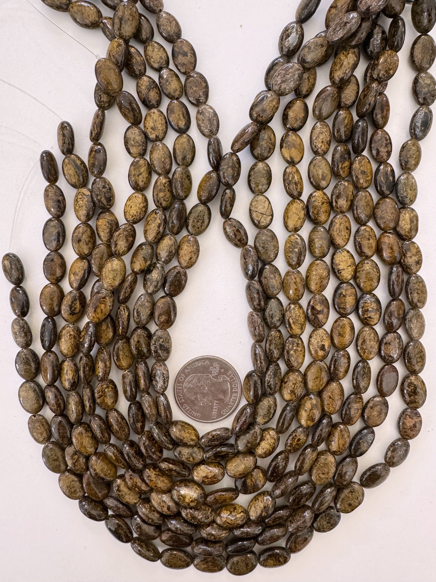bronzite, 11x8x4mm oval, 15