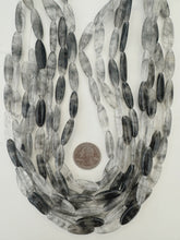 gray cloudy quartz, 24x8x5mm bowed tube, 15" strand, sold per strand, may have some chipped/broken beads