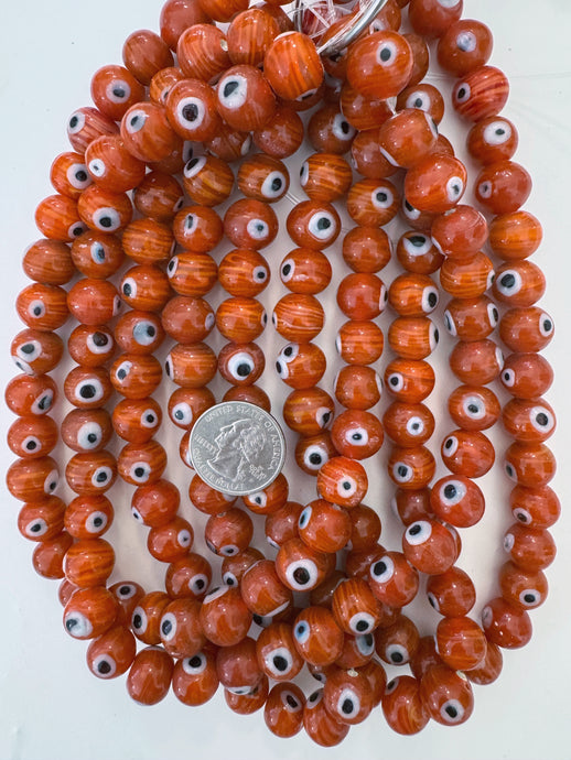red orange swirl black white evil eye motif, vintage look glass, 13x11mm rondelle, 15