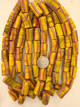 mustard yellow dark swirl red white stripe, vintage look glass, 25x14mm tube, 15" strand, sold per strand