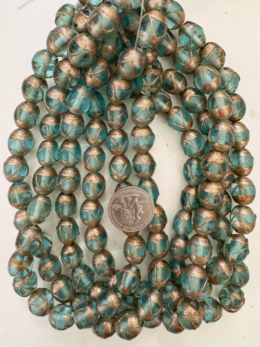 light blue metallic copper swirl, vintage look glass, 14x12mm barrel, 15