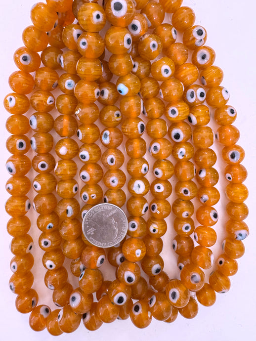 dark pale red orange white swirl, black white evil eye, vintage look glass, 12x10mm rondelle, 15