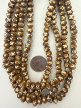 golden brown off white, x dot motif, vintage stock bone, 8x5mm rondelle, 15" strand, sold per strand