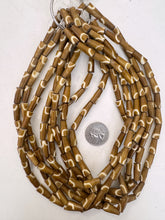 golden brown off white, half circle motif, vintage stock bone, 8x5mm pointed tube, 15" strand, sold per strand