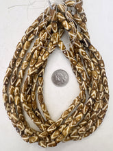 golden brown off white, line dot motif, vintage stock bone, 12x7mm tube, 15" strand, sold per strand (batch 2)