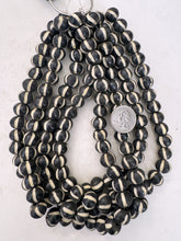 black off white, carved lines motif, vintage stock bone, 14x12mm rondelle, 15" strand, sold per strand