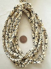 off white black, crossing lines dot motif, vintage stock bone, 25x9mm tube, 15" strand, sold per strand