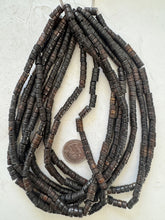 dark brown, carved lines motif, vintage stock bone, 14x8mm - 12x6mm barrel mix, 15" strand, SOLD PER STRAND