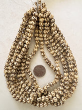 off white brown, carved lines motif, vintage stock bone, 8x6mm rondelle, 15" strand, sold per strand