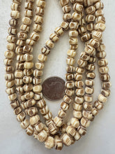 off white brown, carved 3 lines motif, vintage stock bone, 8x6mm rondelle, 15" strand, sold per strand