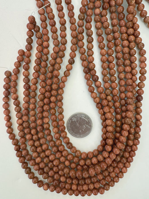 goldstone, 6mm round, 15