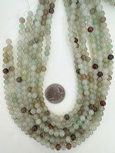 pale dark mint brown color enhanced quartz, 6mm round, 15" strand, sold per strand
