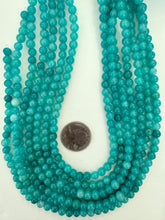 electric teal blue color enhanced quartz, 6mm round, 15" strand, sold per strand