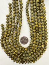 yellow color enhanced serpentine, 8mm round, 15" strand, sold per strand