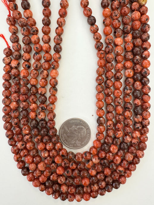 red orange color enhanced serpentine, 6mm faceted round, 15