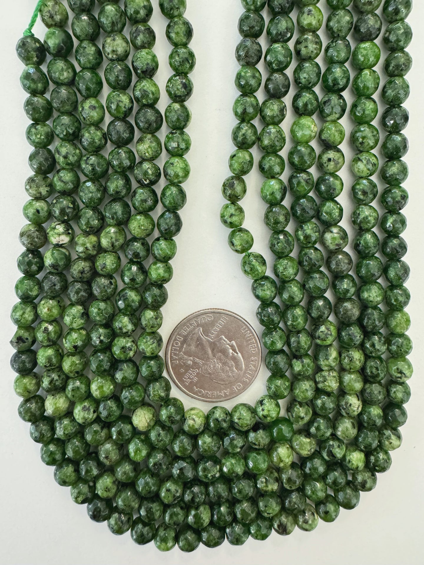 dark green color enhanced serpentine, 6mm faceted round, 15