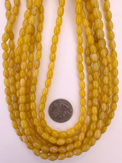yellow jade, 9x5mm bowed rice tube, 15