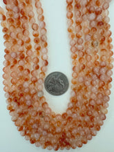 dark red orange off white enhanced quartz, 6mm round, 15" strand, sold per strand