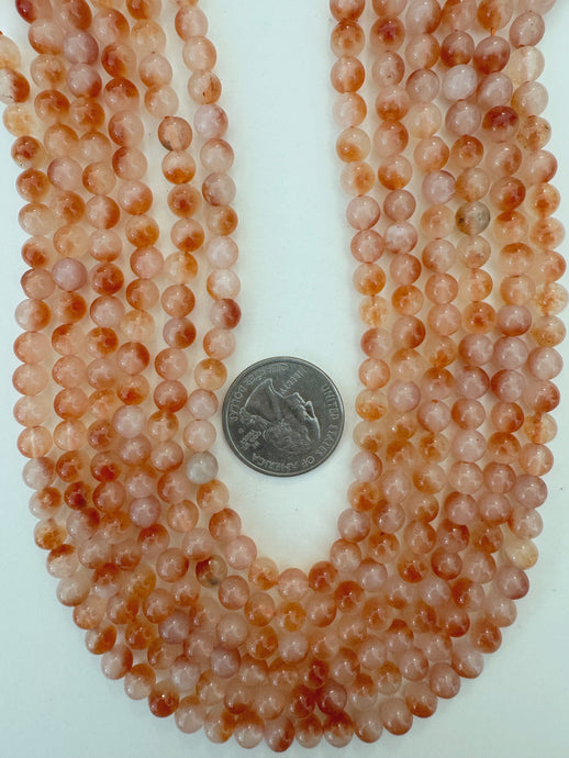 dark red orange off white enhanced quartz, 6mm round, 15