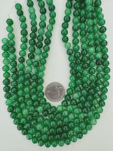 mixed tone emerald green color enhanced quartz, 8mm round, 15" strand, sold per strand