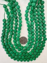 bright emerald green color enhanced quartz, 10x10x6mm coin, 15" strand, sold per strand