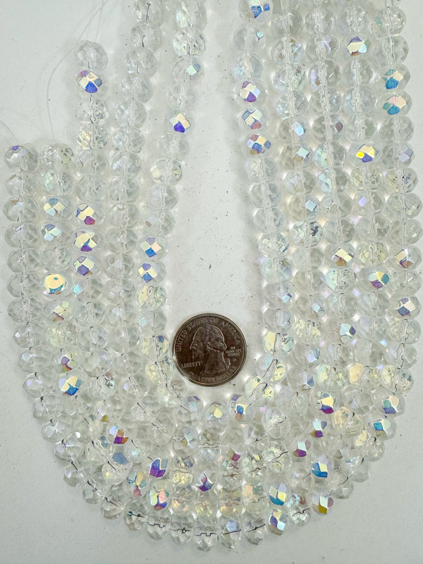 AB finish clear, single color, vintage look glass, 10x7mm faceted rondelle, 14