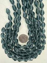 dark blue gray, single color, vintage look glass, 10x7mm fancy facet cut bowed tube, 14" strand, sold per strand