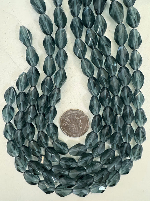 dark blue gray, single color, vintage look glass, 10x7mm fancy facet cut bowed tube, 14
