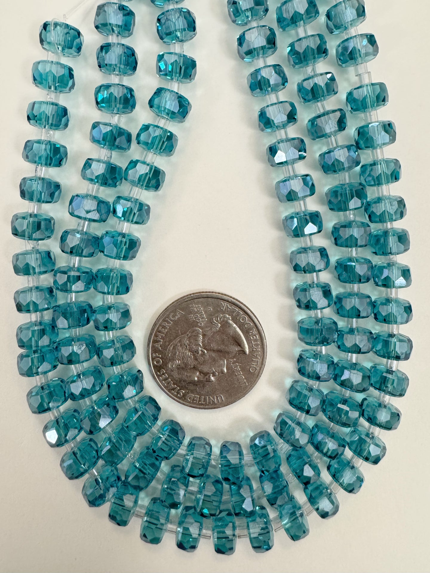 white flash coated dark electric blue, fancy cut, vintage look glass, 8x5mm edge faceted heishi rondelle, 10