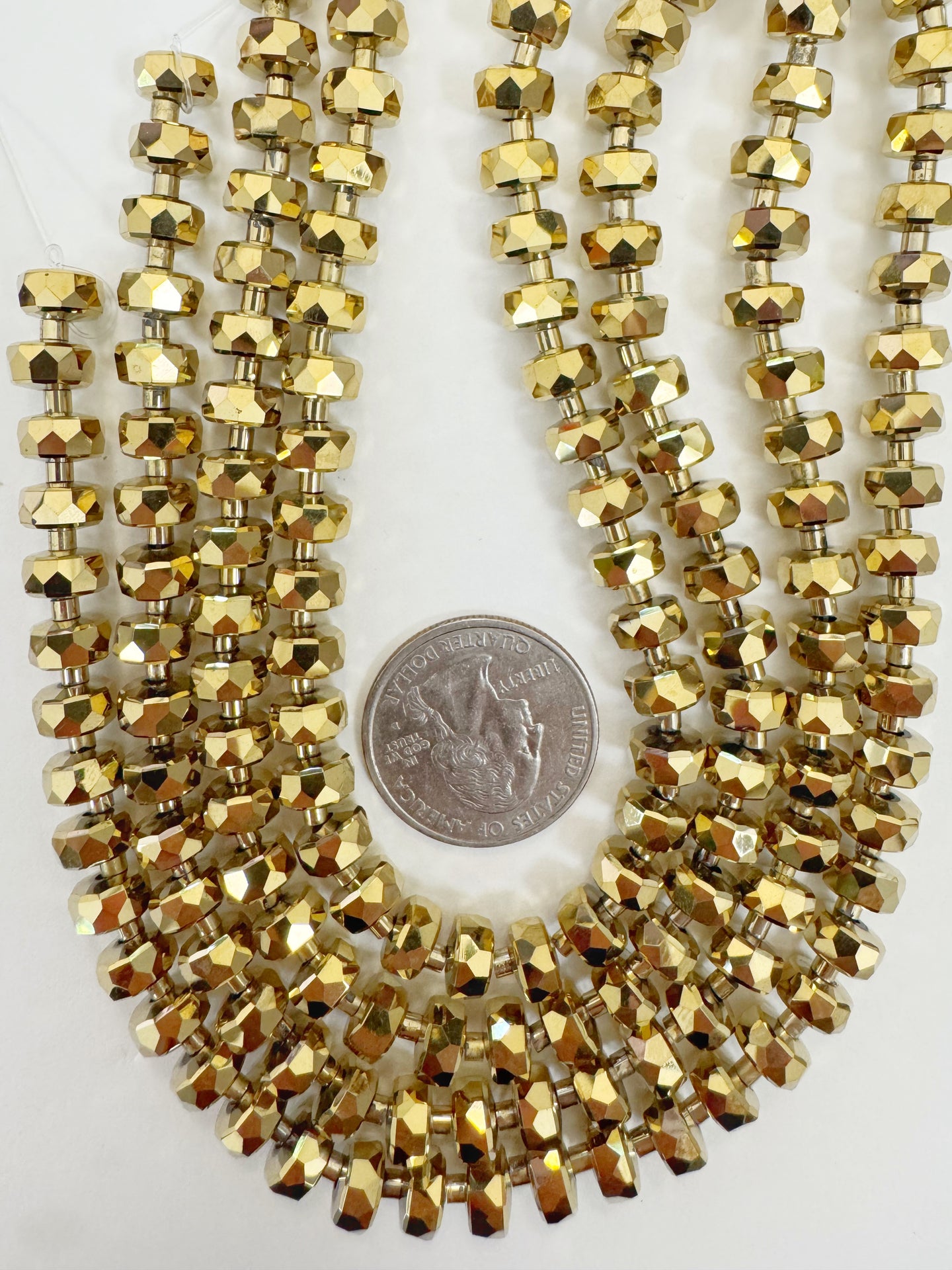 light bronze flash coated, fancy cut, vintage look glass, 8x5mm edge faceted heishi rondelle, 10