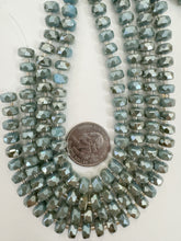 brown flash coated pastel blue, fancy cut, vintage look glass, 8x5mm edge faceted heishi rondelle, 10" strand, sold per strand