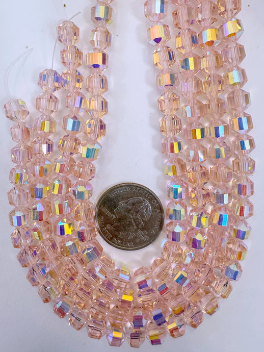 AB flash coated pink, fancy cut, vintage look glass, 7mm faceted bicone barrel, 9.5