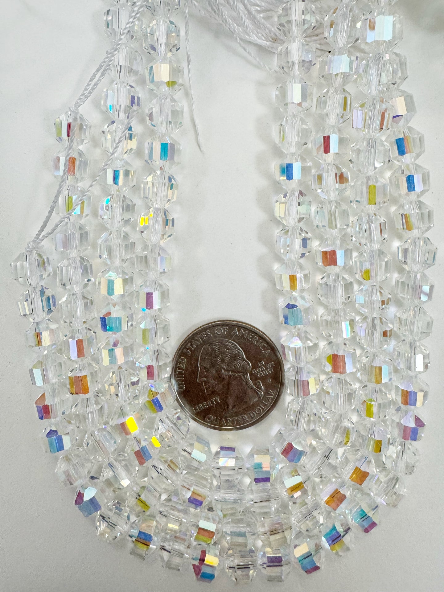 AB flash coated clear, fancy cut, vintage look glass, 7mm faceted bicone barrel, 9.5