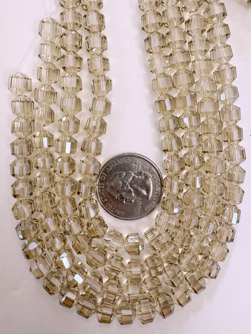 white flash coated pale dark topaz brown, fancy cut, vintage look glass, 7mm faceted bicone barrel, 9.5