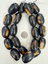 dark chocolate brown off white, faux bone, vintage look resin, 37x24mm tube, 15" strand, sold per strand