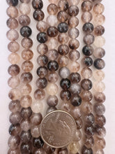 color enhanced quartz: brown purple off white, 8mm round, 15" strand,  SOLD PER STRAND