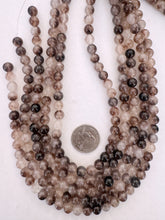color enhanced quartz: brown purple off white, 8mm round, 15" strand,  SOLD PER STRAND