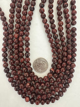 color enhanced serpentine: very dark red orange, 8mm round, 15" strand,  SOLD PER STRAND