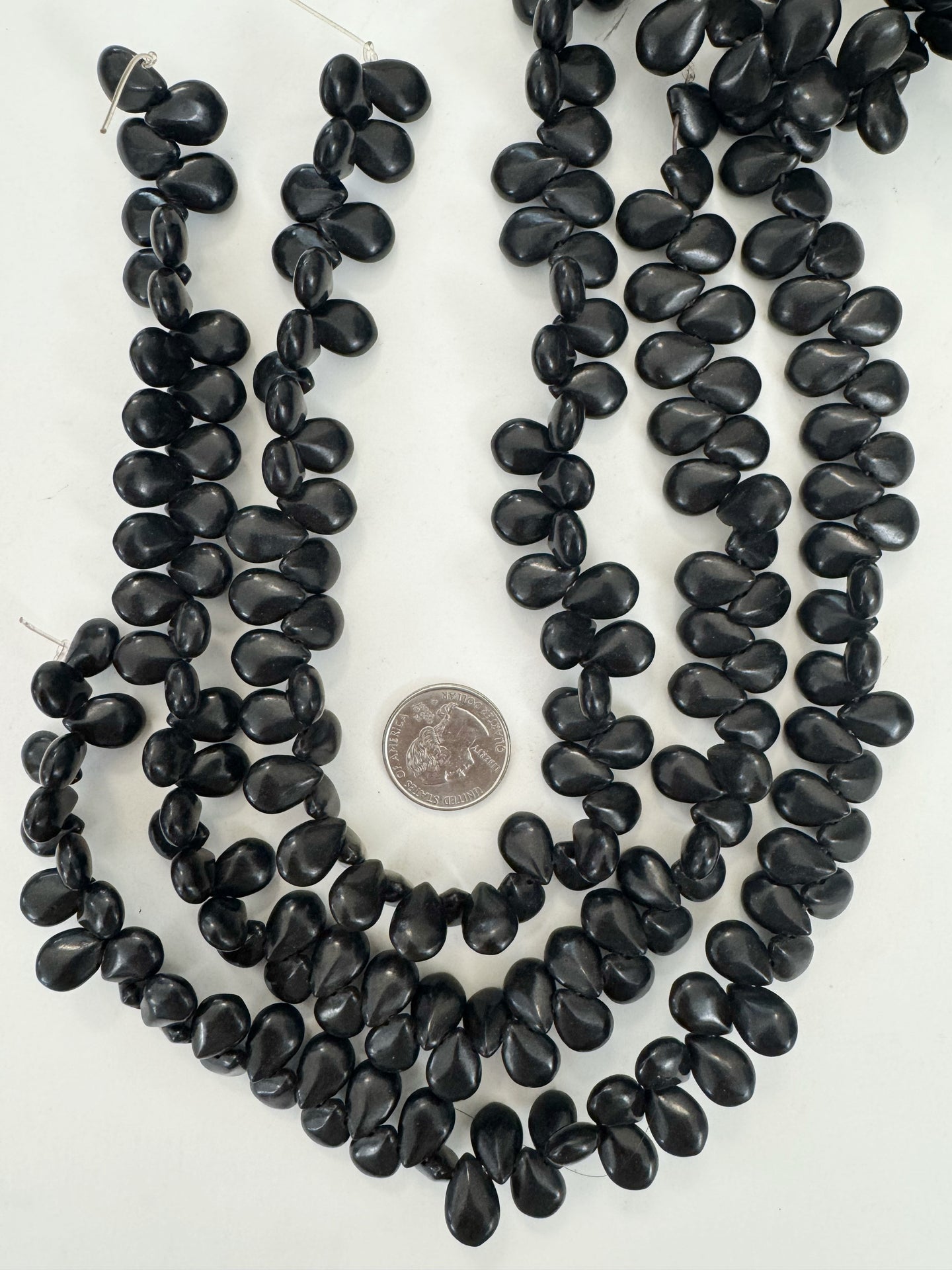 black stone, 17x13x7mm faceted flat oval, 15