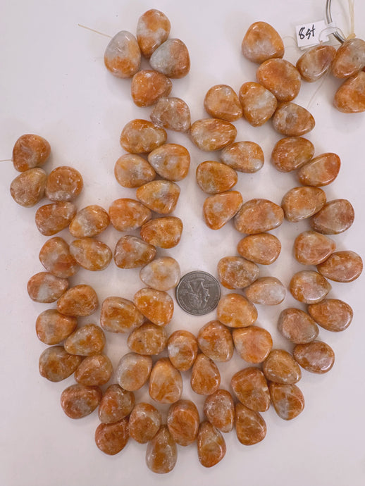 orange calcite, 23x16x10mm mixed nugget pendant, 15