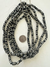 black off white, spiral motif, vintage stock bone, 11x8mm barrel, 15" strand, SOLD PER STRAND