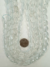 very light aqua blue color enhanced crackle look quartz, 14x10x6mm oval, 15" strand, sold per strand