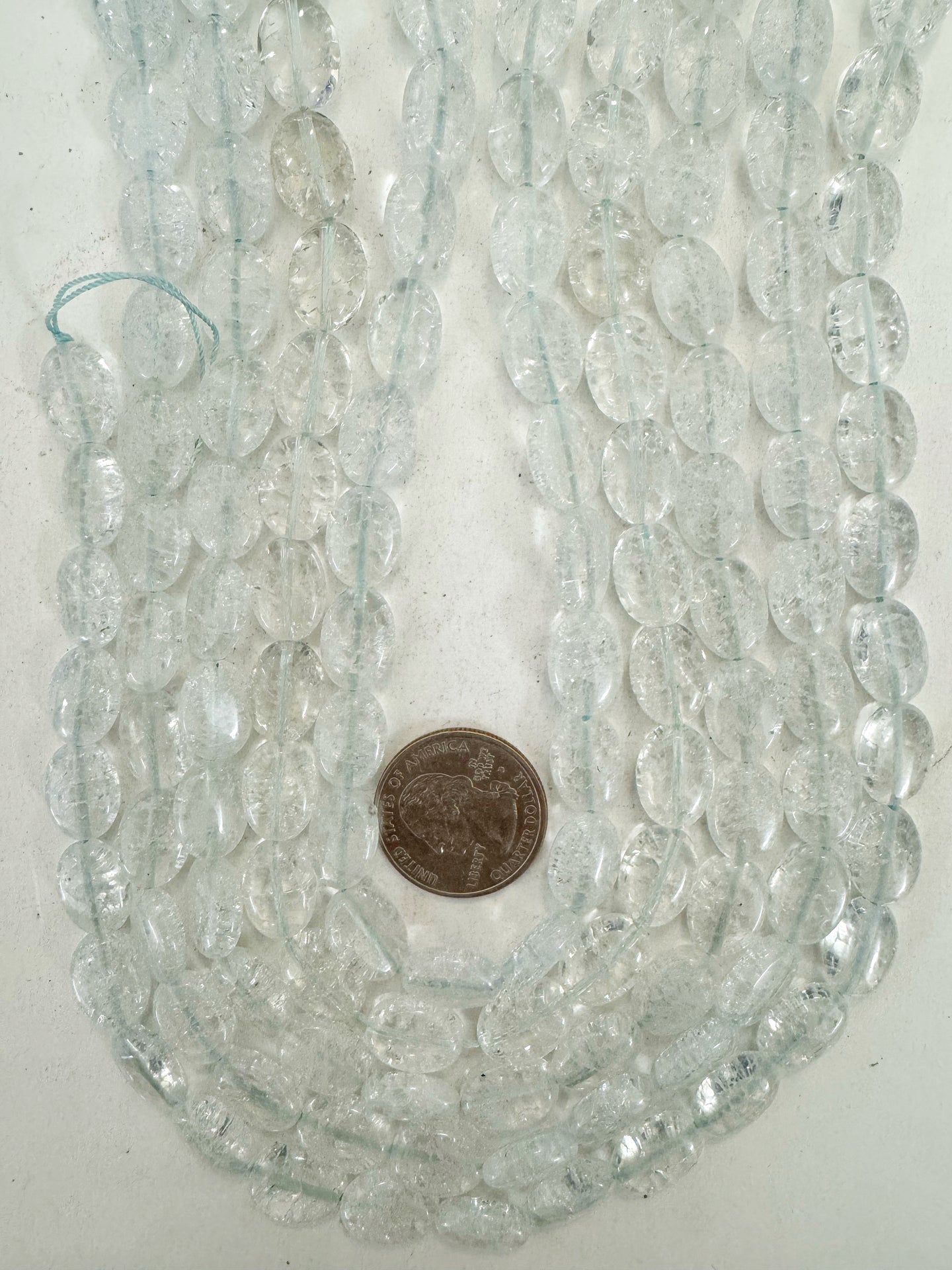 very light aqua blue color enhanced crackle look quartz, 14x10x6mm oval, 15