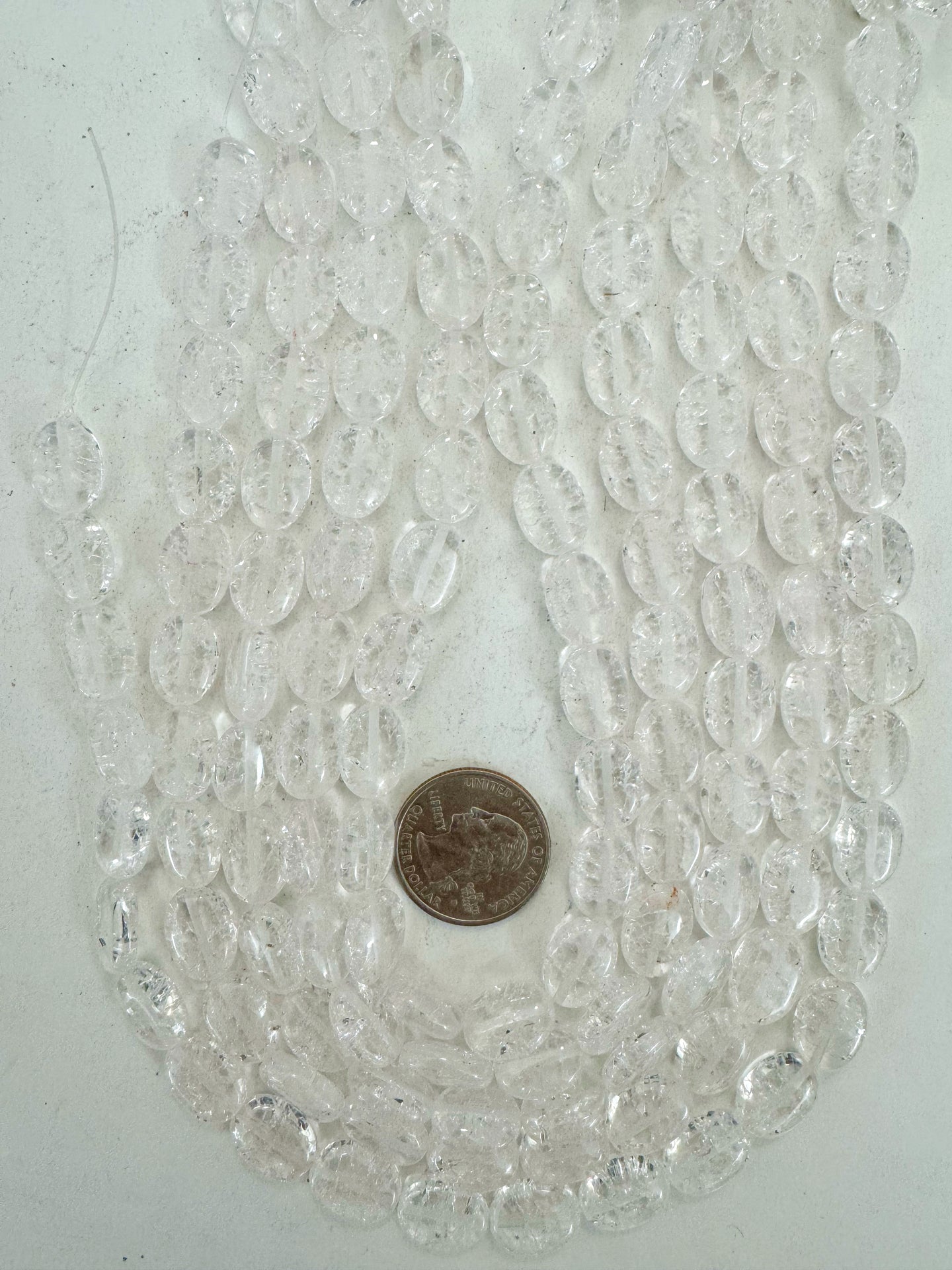 very faint pink color enhanced crackle look quartz, 14x10x6mm oval, 15