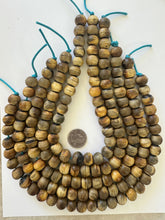 brown, vintage stock horn, 14x12mm rondelle, 15" strand, SOLD PER STRAND